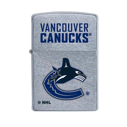 A Zippo lighter with the Vancouver Canucks logo in color on a silver background.