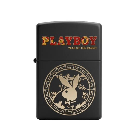 Zippo Playboy Year of the Rabbit lighter with a black and gold design featuring a rabbit and floral elements within a circular pattern.