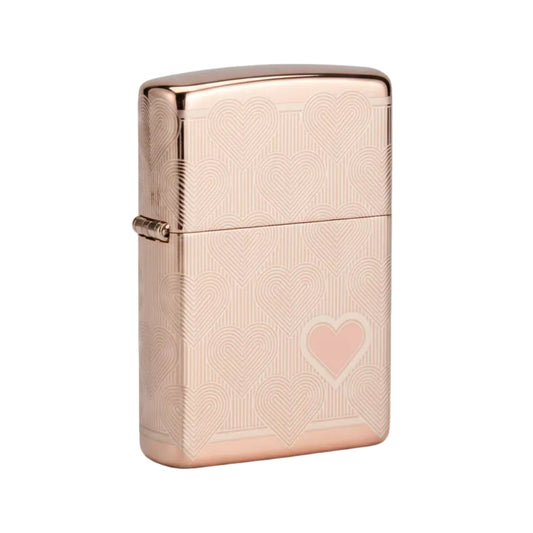 Rose gold Zippo windproof lighter with engraved heart pattern, layered line art hearts, and a raised pink heart accent on the front. - The Wee Smoke Shop
