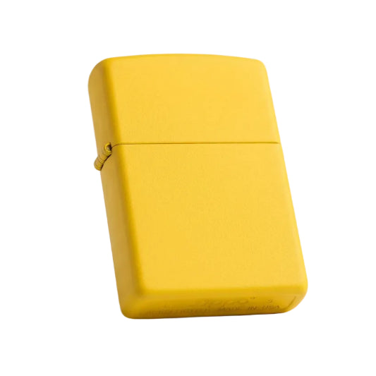 A yellow Zippo lighter with a smooth surface and a visible Zippo logo.